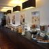 Breakfast buffet at Gästehaus am Karlstor in Karlsruhe with fruit, pastries and cereal dispensers
