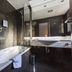 Hotel Rio Bidasoa, Hondarribia bathroom with bathtub, glass shower screen and vessel sink