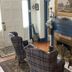 Terrell House B&B in Burnsville living room with plaid armchairs, fireplace, and front door