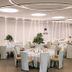 Rvhotels Palau Lo Mirador banquet hall in Torroella de Montgrí with round dining tables and white chairs
