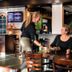 Hotel Frans op den Bult in Deurningen restaurant with server at a table and seated guest