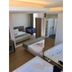 Kentpark Exclusive Hotel in Kahramanmaraş: guest room with mirror, bed, desk, and jacuzzi tub