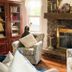 Glenn Meadow Bed and Breakfast in South Haven: cozy sitting room with brick fireplace and patterned chairs