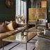 Radisson Blu Resort, Trysil lounge with leather seating and ornate gold cabinet in Innbygda