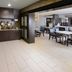 Residence Inn by Marriott Dallas Plano/The Colony breakfast area with tables and self-serve kitchen