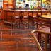 Sheraton Atlanta Airport Hotel bar with wooden stools and polished floors in Atlanta