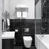 Qudos Salisbury bathroom with bathtub, shower, wall-mounted toilet and heated towel rail