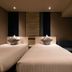 Hotel Jal City Nagasaki, Nagasaki twin room with two beds and a small seating area