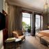 The Winchester Hotel By Newmark Cape Town guest room with balcony doors and seating area