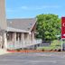 Red Carpet Inn North East sign and motel building exterior in North East