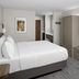 Holiday Inn Express & Suites Montrose - Black Canyon Area By IHG guest room with king bed and wall-mounted TV