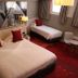 La Confiance in Le Mont-Saint-Michel: guest room with double bed, twin bed, and window seating