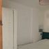 Self Contained Rooms in Central Torquay, Torquay guest room with bed and wardrobe