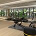 The Bauhinia Hotel - Central gym in Hong Kong with treadmills, weights and floor-to-ceiling windows