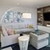 Courtyard by Marriott Delray Beach lounge in Coral Springs with sectional seating, TV wall and bookshelves