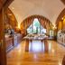 Hotel Grèvol Spa in Llanars dining room with arched wood interior and mountain-view windows