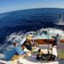 Las Brisas Resort and Villas in Jacó: guests fishing off a boat on the open ocean