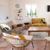 Auberge La Fontaine Aux Bretons in Pornic: cozy lounge with sofas, armchairs, coffee table and dartboard