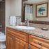 Wyndham Vacation Resorts Steamboat Springs bathroom with tub-shower, toilet and granite vanity