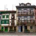 Hotel San Nikolas Sea Views in Hondarribia, colorful streetfront hotel with flowered balconies