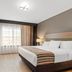 Country Inn & Suites by Radisson, Roanoke, VA guest room with king bed and TV