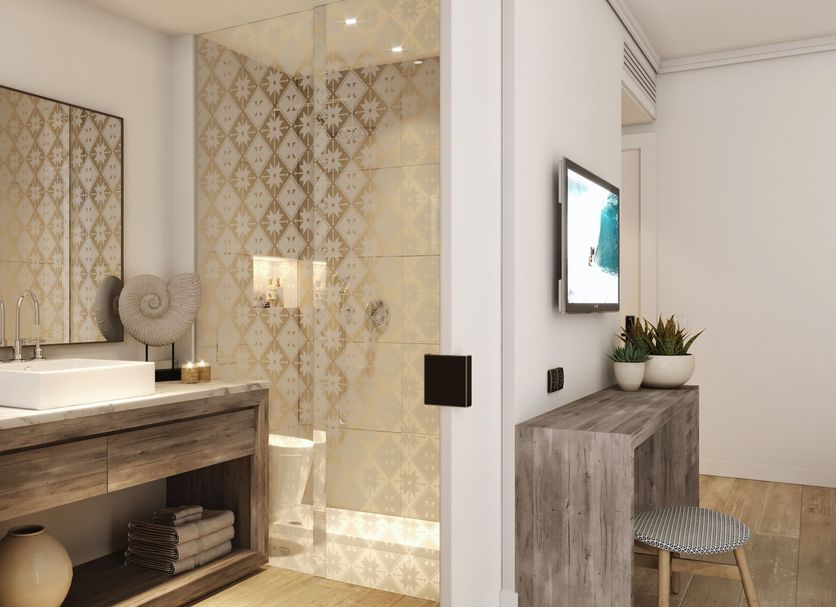 Robinson Cabo Verde - Adults Only bathroom vanity with glass shower and wood desk in Santa Maria