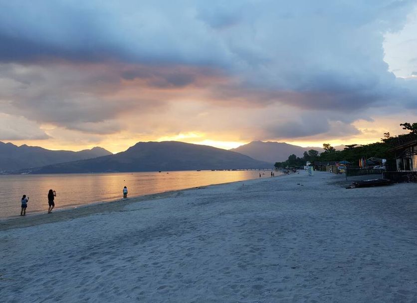 Treasure Island Resort in Olongapo with beachfront sunset and calm bay view