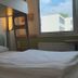 ibis budget Köln Leverkusen City room with bunk bed, white bedding, and window view in Leverkusen