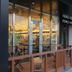 Koko Hotel Osaka Namba Ebisucho entrance with glass storefront and small wooden patio in Osaka