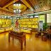 Gentl Grown Sanya Seashore in Sanya, ornate lobby display with golden-lit shelves and chandelier