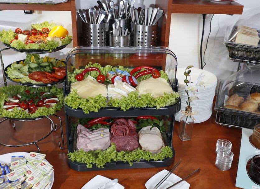 Hotel Condor Hamburg buffet with cold cuts, salads, cheeses and bread