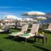 Gf Fañabe, Adeje: rooftop sun loungers and umbrellas with mountain views