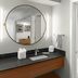 Fairfield Inn & Suites by Marriott San Francisco San Carlos bathroom with vanity, round mirror and shower-tub