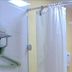 Home Inn Guiyang West Gate in Guiyang bathroom with glass shower enclosure and curtain