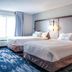 Fairfield Inn & Suites by Marriott Indianapolis Noblesville guest room with two queen beds and window view