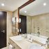 Sercotel Puerta de la Catedral bathroom in Salamanca with double sink, large mirror and bathtub