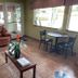 Motel 6 Riviera Beach lobby with sofa, table, chairs, and large windows
