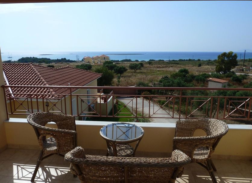 Elafonisos Diamond Resort in Elafonisos, balcony with wicker chairs and sea view
