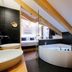 Hotel Maribel in Madonna di Campiglio: attic suite with soaking tub, dual sinks and mountain-view bedroom