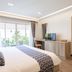 Vayna Boutique Koh Chang in Ko Chang guest room with king bed, TV, desk and balcony view