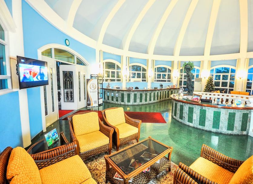 Breakfast at Monaco - Palais Boracay breakfast lounge with curved bar and waterfront views in Boracay