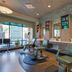 The Mosey Buffalo Williamsville salon with styling chairs, mirrors and product shelves