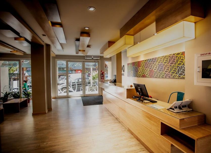 Hotel EcoSki by bund lobby in San Carlos de Bariloche with reception desk and seating area