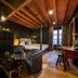 Palma Riad in Palma de Mallorca luxury suite with king bed, sitting area, and balcony door