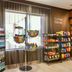 Fairfield Inn and Suites by Marriott Weirton corner market with snacks, drinks, and a refrigerated case