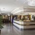 Hotel Nuevo Vichona Spa 3 estrellas Superior lobby with reception desk and chandelier in Sanxenxo