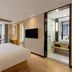 Echarm Hotel Chongqing West Railway Station guest room with city view and open bathroom, Chongqing