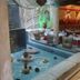 Hotel Art in Sarajevo indoor pool with decorative stone accents and lounge seating
