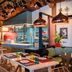 Vier Jahreszeiten Am Schluchsee restaurant with copper pendant lights, bar counter, and colorful dining tables