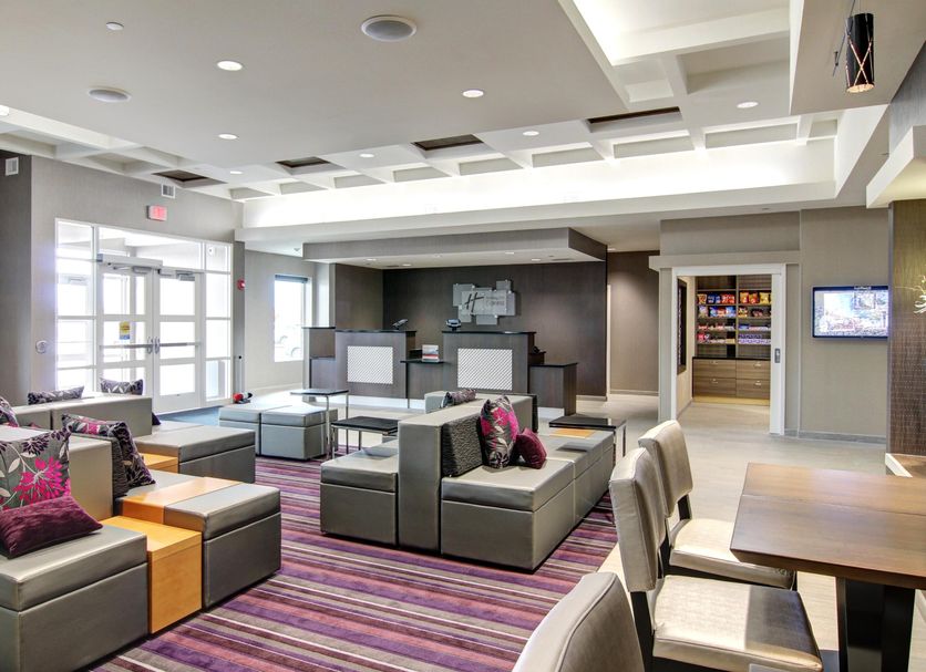 Holiday Inn Express Fargo Sw - I-94 Medical Center lobby with seating area and breakfast nook in Fargo